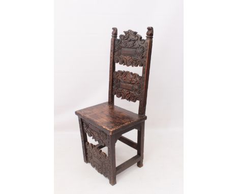 An 18th&nbsp;century and later carved oak and beech back stool, probably Continental &ndash; the back with two deep, foliate 