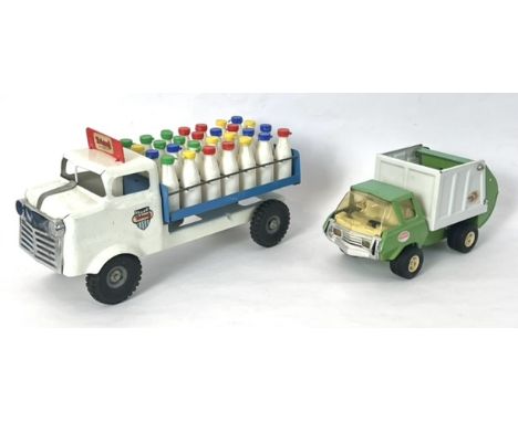 Two 1960s-70s pressed steel large-scale toys by Tri-ang and Tonka - comprising a Tri-ang Milk Truck in blue and white, with a