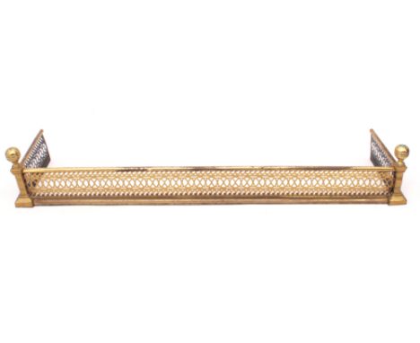 A Regency style pierced brass fender - Edwardian, 111cm long, 27cm deep, internal size 103.5 x 24.5cm.