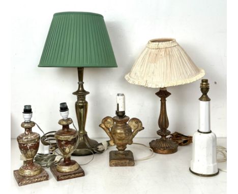 Three antique Italian carved giltwood table lamps - converted from candlesticks, comprising a pair of urn form with silvered 