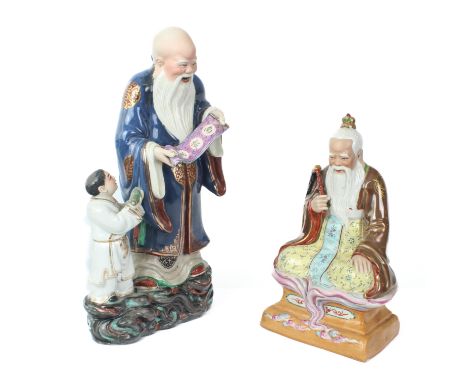 Two modern Chinese porcelain figures of deities - late 20th century, in famille rose enamels, the larger 37cm high.* The figu