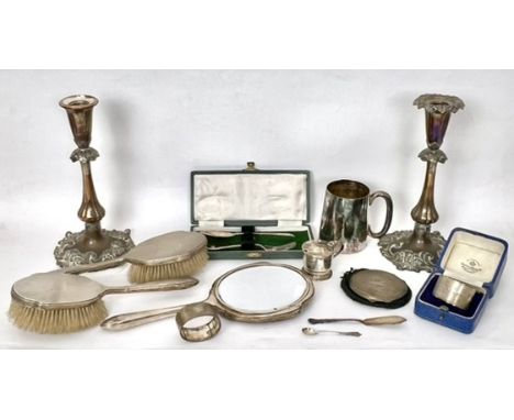 A small group of silver items - comprising a three piece George V dressing table set by Walker &amp; Hall, Sheffield 1935; an