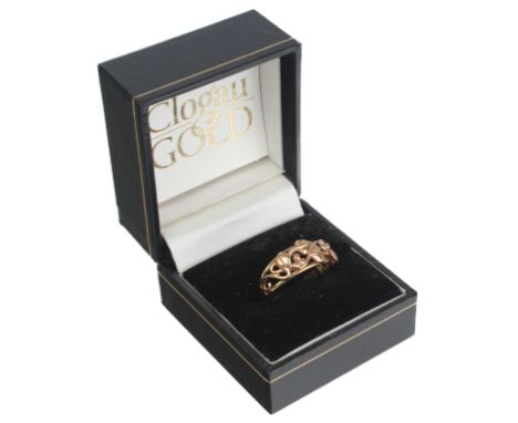 A 9ct rose gold ring by Clogau - the pierced band with Art Nouveau style foliate and berry decoration, size P, in the origina