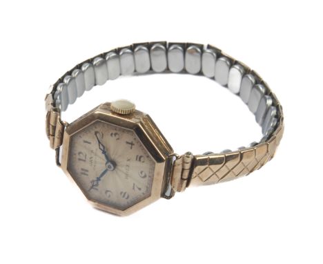Rolex: an Art Deco 9ct yellow gold ladies manual wrist watch - the silvered sunburst dial signed 'Rolex' and for the retailer