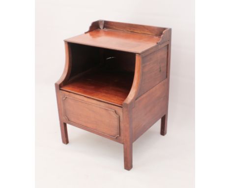 An early 19th century mahogany commode cabinet - the hinged top over a hinged seat concealing the original chamber pot, over 