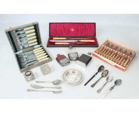 A cased three-piece carving set with silver ferrules, Sheffield 1903, together with three hip flasks, two sets of fish knives