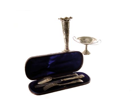 A William IV and later associated Christening set, the spoon, fork and knife in presentation case initialled ELM, together wi