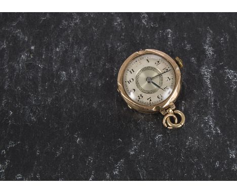 An Art Deco 9ct gold lady’s fob watch, converted from a wristwatch and now with bale and link, having silvered engine turned 