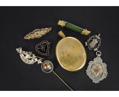 A small collection of Victorian and early 20th century jewellery, including a silver and rose gold bar brooch, with bird and 