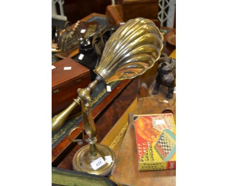 A brass desk lamp, shell shaped shade, 27cm high