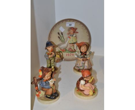 A Goebel Hummel figure, others; a Goebel 1974 plate