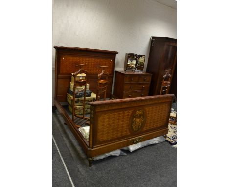 An Edwardian mahogany double bed, boxwood stringing and inlay with basket of flowers