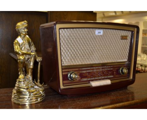 A Vintage Stella radio, a brass cast figure of a miner with his pick and lamp (2)