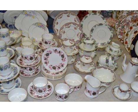 Teawares- Tuscan china part tea service; a Windsor china part tea service; a Paragon china part tea service; a Paragon Michel