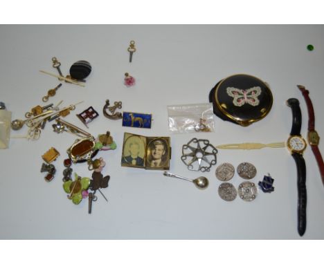 A silver mustard spoon;  ceramic flower brooches;  a silver dress ring;  gold coloured watch; another 9ct gold brooch ,enamel