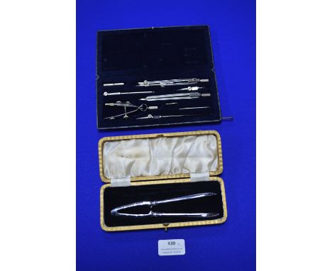 Cased Nutcracker, and a Geometry set 