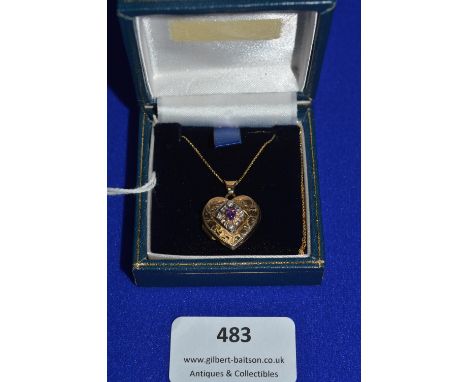 9k Gold Locket with Amethyst ~3.3g gross 