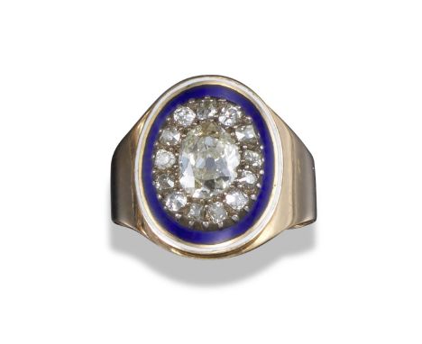 A George III diamond cluster ring, centred with an old oval-shaped diamond within a surround of smaller cushion-shaped diamon
