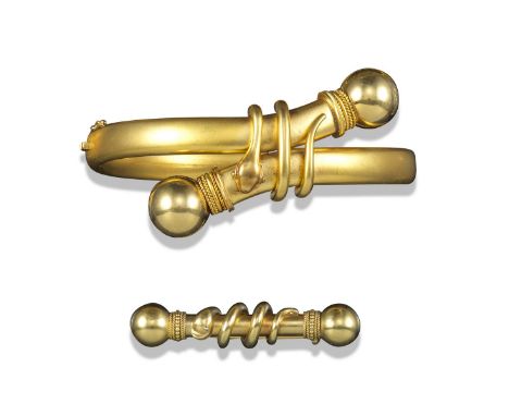 An early 20th century yellow gold serpent bangle and matching bar brooch, the hinged bangle with crossover centred section an