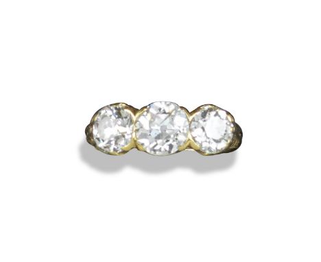 A late 19th century diamond three-stone ring, set with graduated old circular-cut diamonds weighing approximately 2.65cts in 