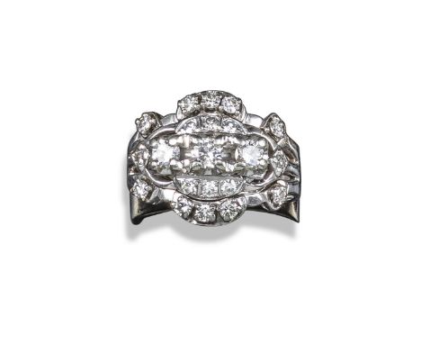 A diamond cluster ring, set with graduated circular-cut diamonds in white gold, size L 1/2, in silver ring box by Birks