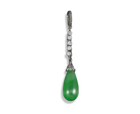 A jade and diamond pendant, the jade drop suspends from an articulated line of diamonds set in platinum and gold, 4cm long Th