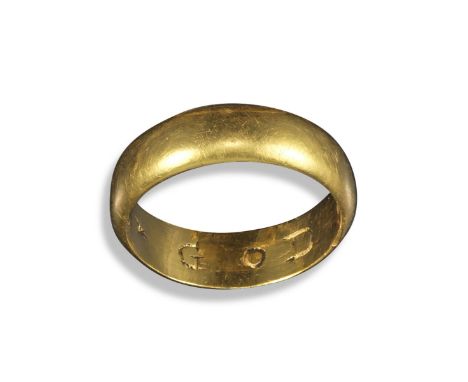 A Religious late 17th century yellow gold posy ring, the smooth yellow gold rounded shank engraved to the inside with "Feare 