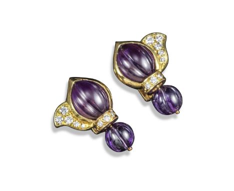 A pair of amethyst and diamond drop earrings by Boucheron, the two fluted cabochon amethysts are set with small circular-cut 