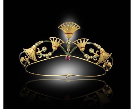 An early 20th century Egyptian Revival gold tiara, which can also be worn as a choker necklace, designed as scrolling lotus f