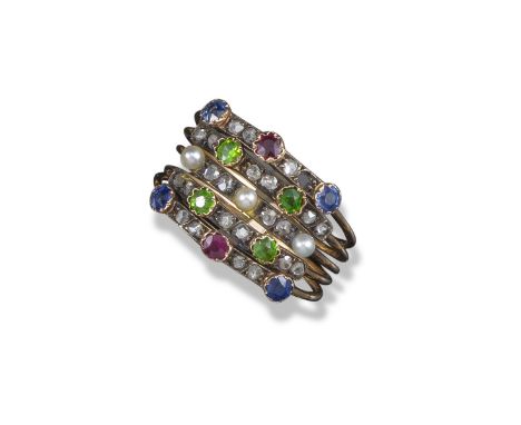 A late Victorian gem-set harem ring, the five rows alternately-set with rose-cut diamonds (one missing), sapphires, rubies, d