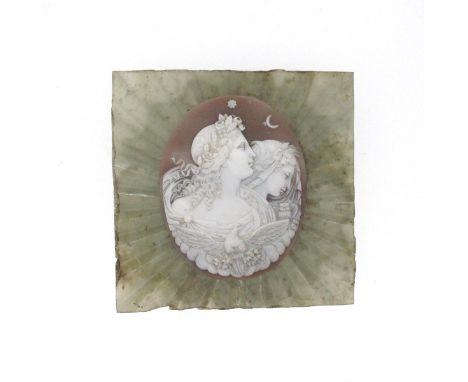 A carved shell cameo-mounted square carved jade plaque, the cameo depicting the Nyx and Hemera with dove and owl attributes, 