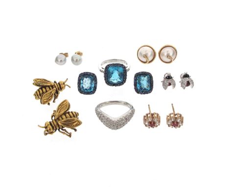 A small collection of jewellery, including a cushion-shaped blue topaz-mounted 9ct white gold ring, set within a surround of 