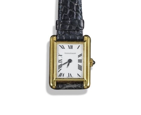 JAEGER LECOULTRE - A yellow gold rectangular lady's wristwatch, manual winding, signed dial with black Roman numerals and bla