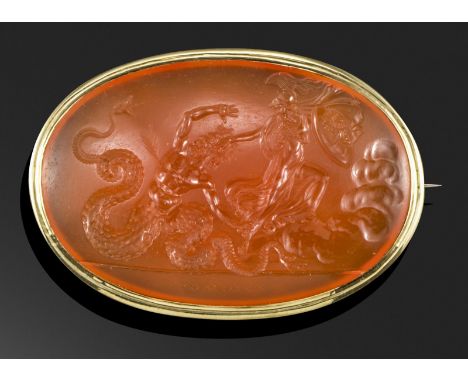 A Neoclassical carnelian intaglio, the oval-shaped carnelian plaque engraved with a scene depicting 'Minerva seizing the mons