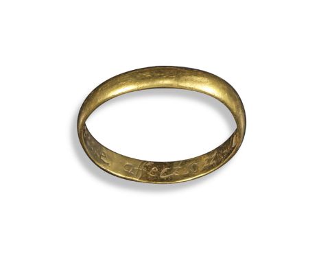A late 17th Century yellow gold posy ring, the plain yellow gold shank engraved to the inside with "Let Vertue rule affection