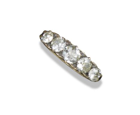 A late 19th century diamond five-stone ring, the graduated old circular-cut diamonds with diamond pointers set in carved and 