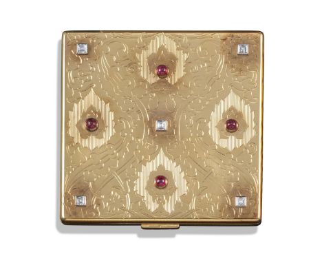 A ruby and diamond compact by Mauboussin, engraved with engine-turned decoration and set with ruby cabochons and square diamo