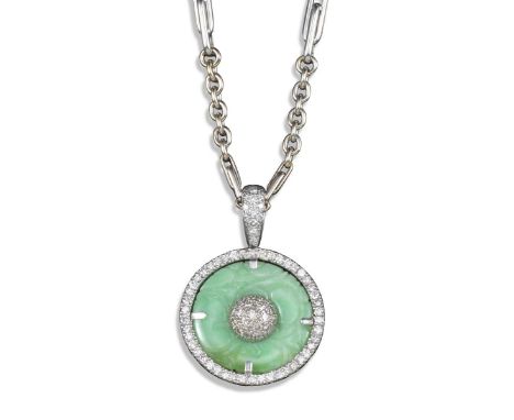 A jade and diamond pendant, the circular jade disc mounted to each side with a diamond-set semi sphere, set within a circular