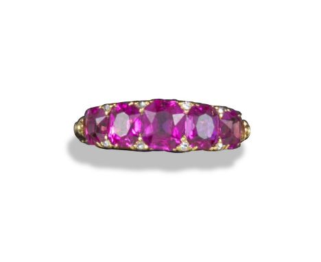 A late Victorian five-stone ruby ring, the half-hoop ring set with five graduated cushion-shaped rubies each separated with a