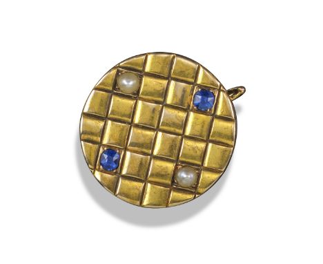 A circular gold brooch set with two pearls and two sapphires, unmarked but probably Russian, engraved with square-shaped patt