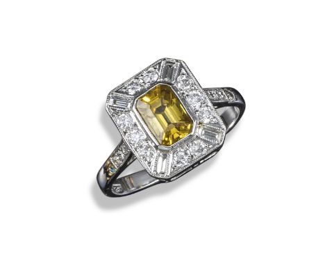 A yellow sapphire and diamond ring, the emerald-cut yellow sapphire weighs approximately 1.10cts and is rubover-set within a 