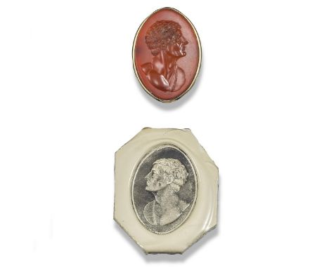 A navette-shaped carved carnelian intaglio, probably 18th century, depicting the profile of a youthful man, later mounted as 