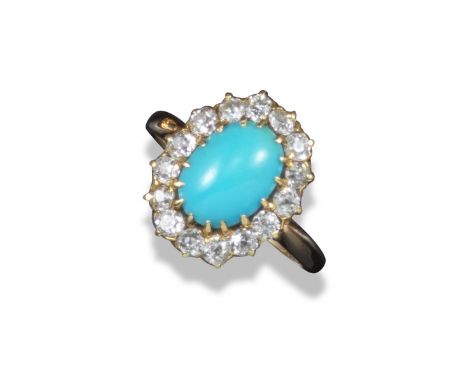 A turquoise and diamond cluster ring, the turquoise cabochon set within a surround of old circular-cut diamonds in gold, size