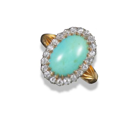 A late 19th century turquoise and diamond cluster ring, the oval turquoise cabochon is set within a surround of cushion-shape