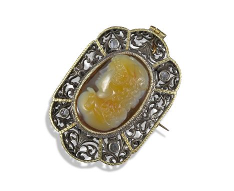 A carved agate cameo-mounted brooch, probably early 19th century, depicting the profile of Hercules wearing the Nemean lion c