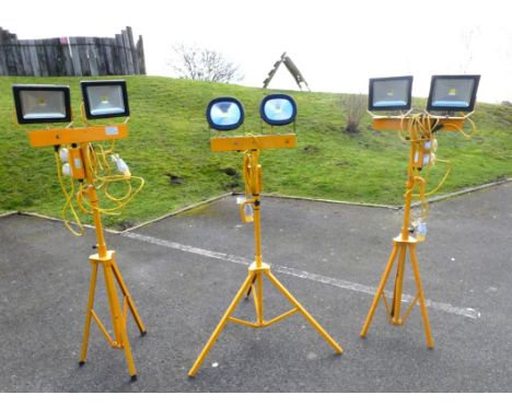 Two Elite 110v 2 x 30w retractable leg lighting units, also an Elite 110v 2 x 50w retractable leg lighting unit to include a 
