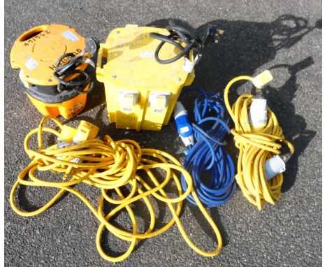 A Defender 230v - 110v power tools transformer, a Defender 100v-130v power pod, to include three compatible extension cables.