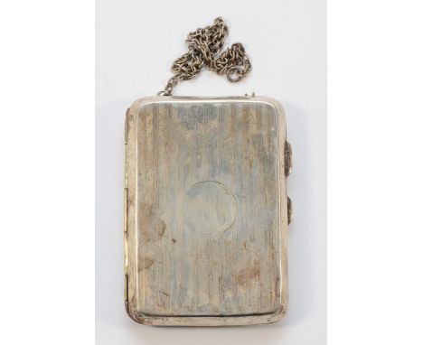 A silver cigarette case, Birmingham 1918, with chain, 9x6cm, 76gm.