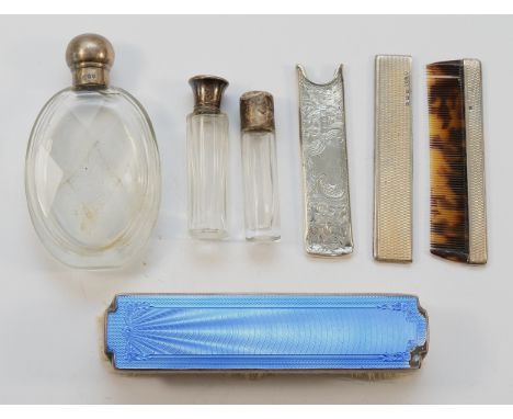 A silver and guilloche enamel clothes brush, Birmingham 1934, together with a silver cased comb, Birmingham 1939, a silver co