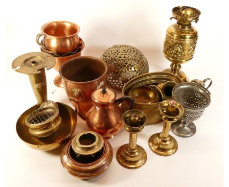 An assortment of metalwares, primarily brass and copper, to include, a copper Argy Europe coffee pot, a hammered brass candle
